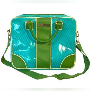 Double Dutch Club laptop bag in blue with green polka dots